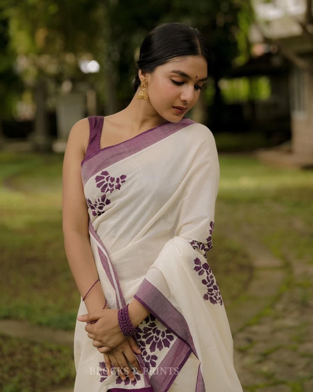 Purple saree with silver jari border