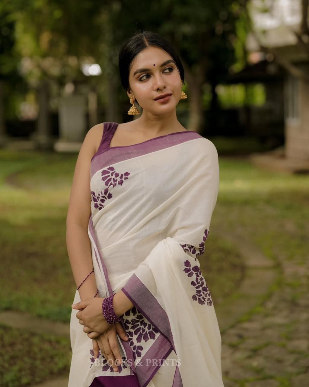 Purple saree with silver jari border